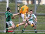 Neil McManus fires the ball past Limerick goalkeeper Brian Murray during Antrim's Senior Hurling Challenge game with the Treaty men in Ballycastle