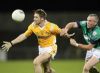 Antrim's Tony Scullion in action against London's Conor Beirne during Saturday evening's NFL Div 4 tie at Casement Park. 
