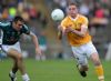 Kevin McGourty in action against Kildare's John Doyle