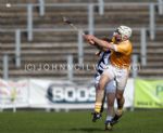 Neil McManus sends over a late Antrim point during Sunday's comeback win over Laois at Casement Park. 