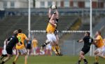 Sligo's Tony Taylor makes a spectacular high catch above Antrim's Kevin McGourty during Sunday's Allianz NFL Division 2 basement battle at Casement Park. Pic by John McIlwaine