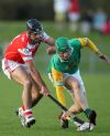 Loughgiel's Barney McAuley and Dunloy's Paul Shiels battle for possession duirng Sunday evening's SHC semi-final in Ballycastle. Pics by John McIlwaine