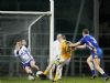 Antrim captain Paddy Cunningham fires the ball to the Clare net during Saturday evening's NFL Division 4 game at Casement Park