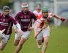 Loughgiel's Joey Scullion wins possession as Cushendall's Aiden McNaughton and Conor Carson close in during  Sunday evening's Senior Feis Cup semi-final in Dunloy