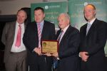 Jim Brady accepts St Brigid's award 