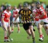 Ballycastle's Mickey Dallat and Loughgiel's Barney McAuley in a race for possession during Saturday's SHC semi-final in Armoy. 