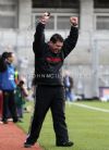 We did it! Team manger PJ O'Mullan shows his delight at the final whistle.
