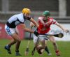 Loughgiel's Benny mcCarry gets past Na Piarsaigh's James O'Brien during Saturday semi-final at Parnell Park