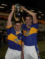 Rossa joint captains Johnny McGuinness (left) and Liam McAuley lift the Neill Patterson Cup after their team's win over Dunloy in the final of the Under 21 Hurling Championship at Casement Park. Pic by John McIlwaine