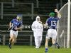 St Gall's Sean McAreavey (12) is congratulated by teammate Kieran Gall after scoring his team's goal in Wednesday evening's shock 1-12 to 1-9 SHC win over Dunloy at Casement Park. 