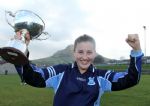 St Louis captain Aimee McAtamney lifts the Fr Davies Cup after her team's win over St Lillians in Saturday's final in Cushendall. Pic by John McIlwaine