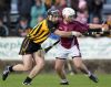 Cushendall's Mark Donghy wins the ball as Ballycastle's Cormac Donnelly tackles