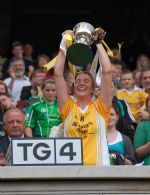 Geardine McCann lifting the Ladies All-Ireland Junior Trophy