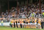 Antrim players join in the minute's applause for former Roscommon great Dermot Earley who died last week. Earley's son Dermot jnr. was a member of the Kildare team who Antrim played out an exciting draw with in Newbridge on Saturday evening. Pic by Aidrian Melia