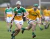 Glenariffe's Conor McAlister gets away from Dunloy's Paul Shiels during Sunday's All County Hurling League game in Waterfoot. Pics by John McIlwaine