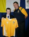 Daniel Donnelly from Corpus Christi receives his Year 8 Football Award from Sean Fleming.