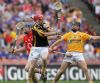 Antrim goalkeeper Chris O'Connell wins the ball as Cork's Patrick Horgan and Antrim's Sean Delargy during Sunday's All Ireland Hurling Quarter-final in Croke Park.
