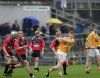Malachy Molloy strikes a long clearance out of defence