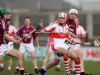 Del La Salle's Stephen Daniels holds off the challenge of Cushendall's Shane McNaughton and Brian Delargy during Sunday's All Ireland Club Hurling semi-final at Parnell Park. 
