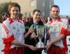 Joint captains Declan Stranney and Stephen Lynch receive the Northern Bank trophy. 