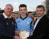 Glenarm captain Michael Mulvenna receives the Section 2 trophy from Tony Chivers and NA Developemnt Officer Seamus Elliott 
  
