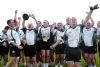 Ardoyne team celebrate after a convincing victory in the JFC Final.