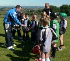 St. Enda's Cul Camp participants with special guest Eoin Kelly - Tipperary All-Star Hurler