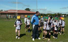 St. Enda's Cul Camp participants with special guest Eoin Kelly - Tipperary All-Star Hurler