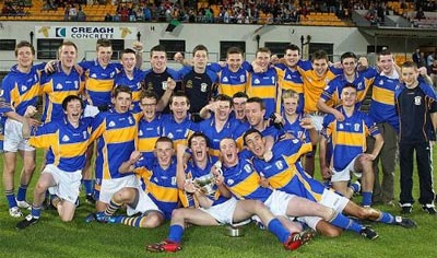 Rossa Minor Footballers celebrate their historic county title.